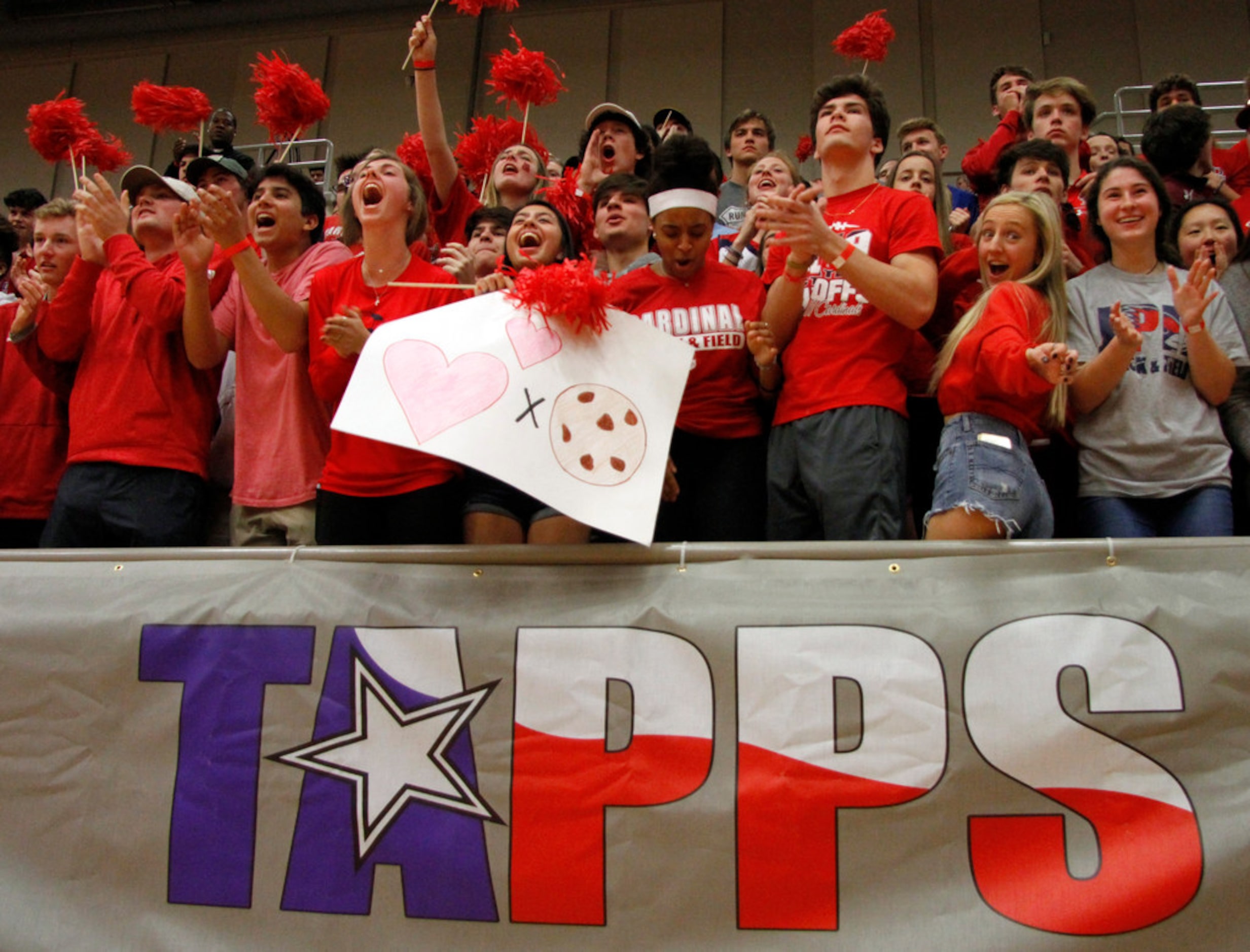 A large contingency of Plano John Paul ll fans voice their support during team introductions...