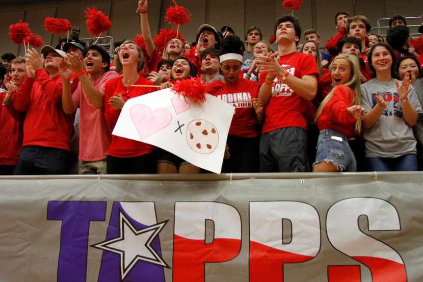 A large group of Plano John Paul ll fans voice their support during team introductions prior...