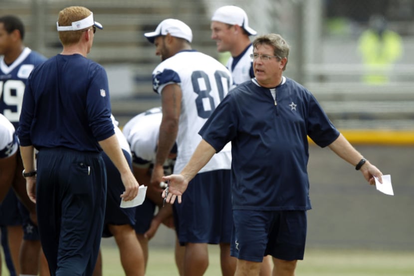 Dallas Cowboys offensive coordinator Bill Callahan talks with Dallas Cowboys head coach...