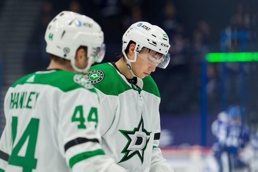 TAMPA, FL - MAY 5: Joel Hanley #44 and Jason Robertson #21 of the Dallas Stars react to the...