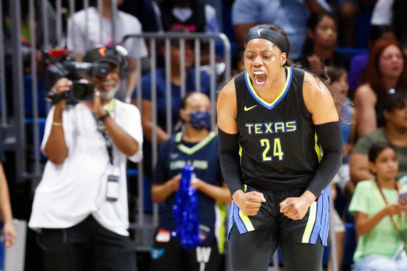 Dallas Wings guard Arike Ogunbowale reacts out of frustration after no foul called against...