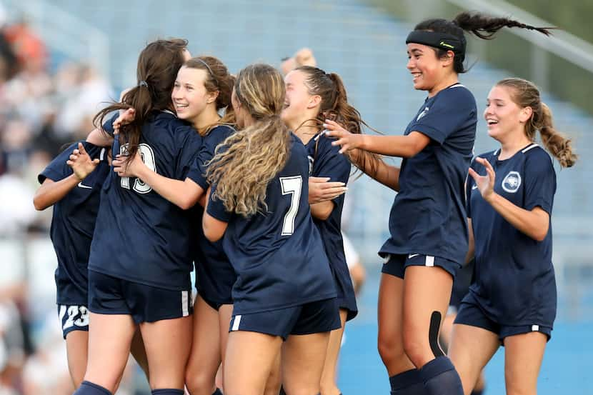 Lewisville Flower Mound players celebrate after a goal against Austin Vandegrift during...