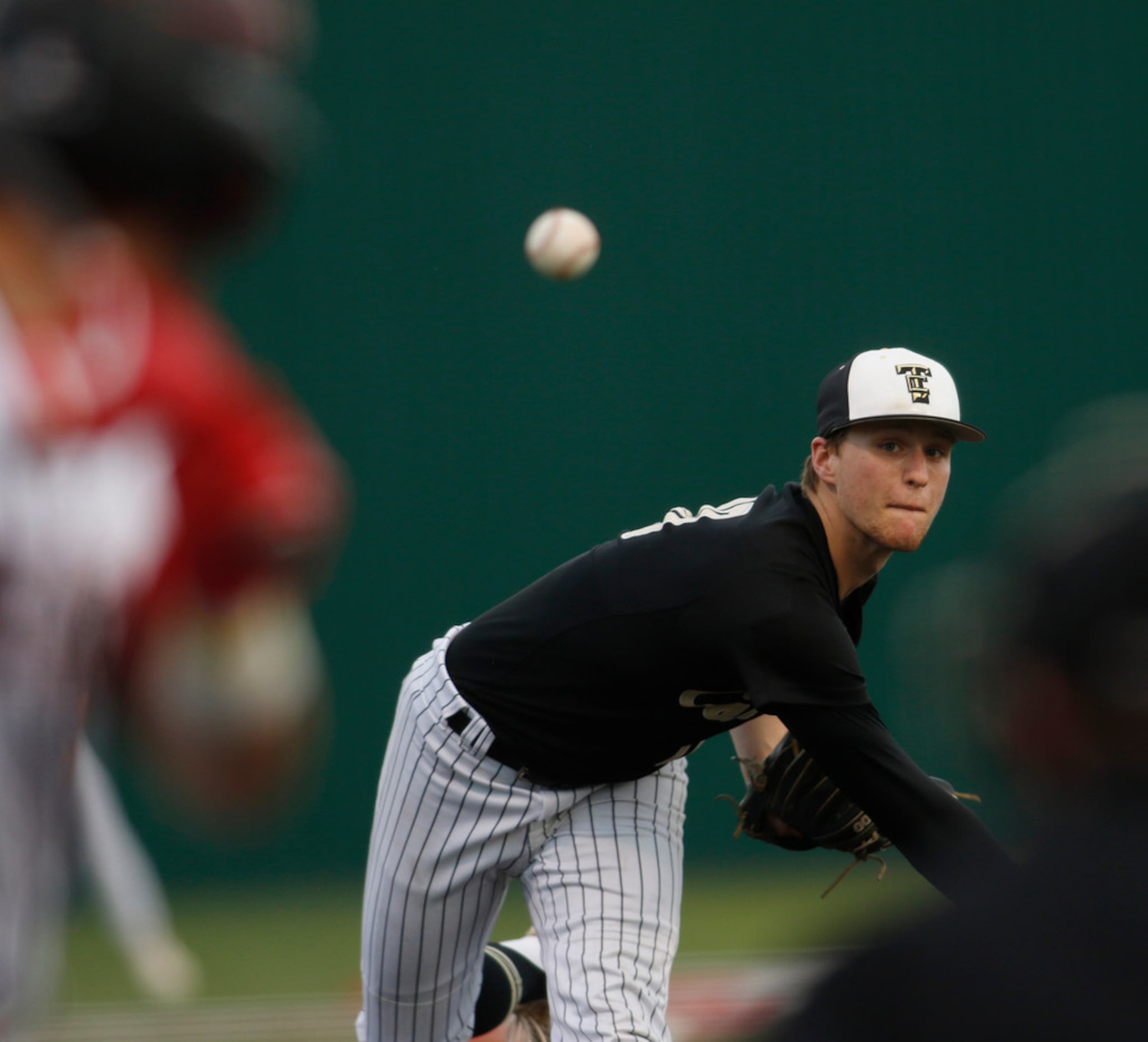 The Colony pitcher Ryan Scott (10) delivers a pitch to a Rockwall Heath batter during the...