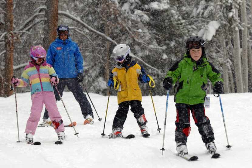 A Ski School class makes first tracks through the freshly fallen snow at Email:...