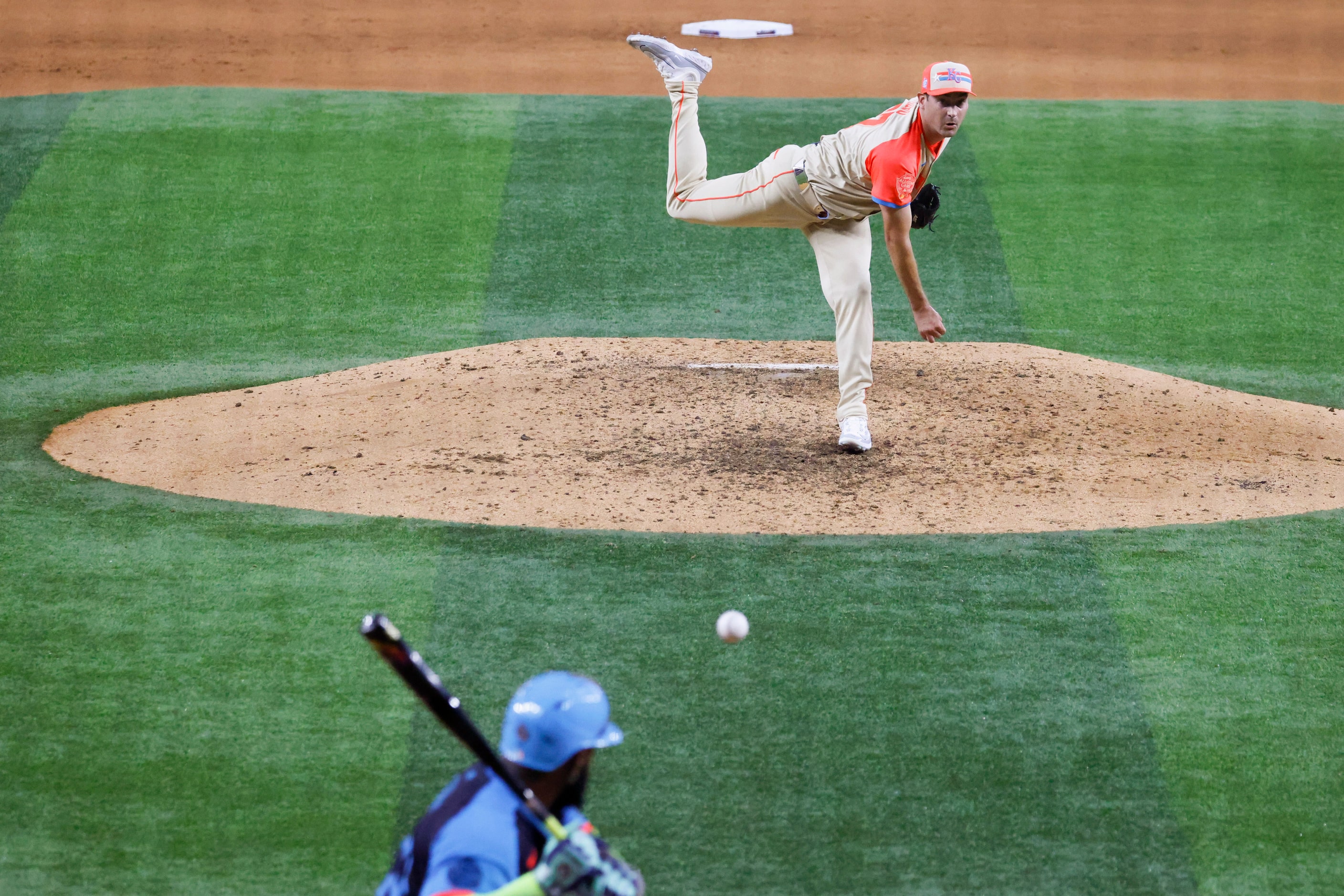 American League's Seth Lugo, of the Kansas City Royals, throws during the seventh inning to...