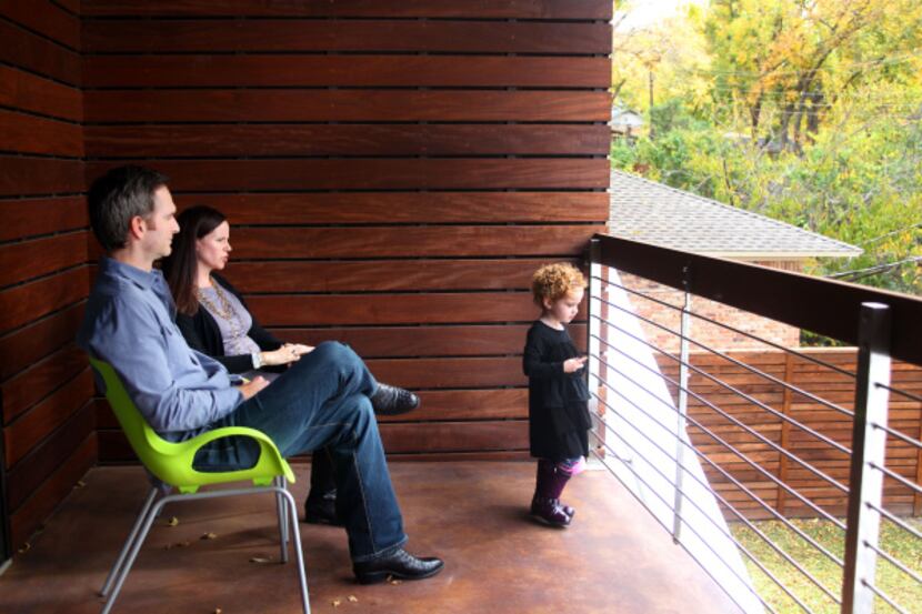 Amy Horton says she gave in to husband John's wish for a home with a modern profile. Parker...