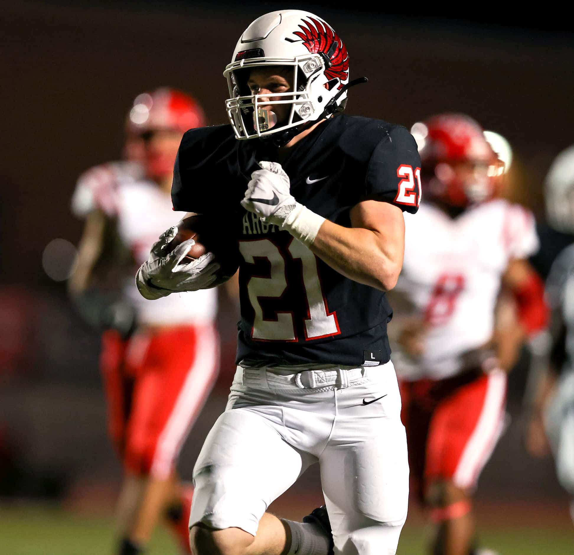Argyle running back Peyton Shoemake (21) goes 37 yards for a touchdown against Terrell...