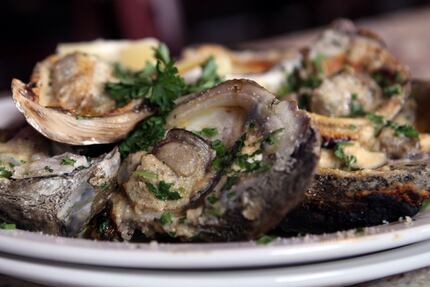 Oysters at 504 Bar and Grill come raw, Rockefeller or grilled (pictured, at Dodie's).