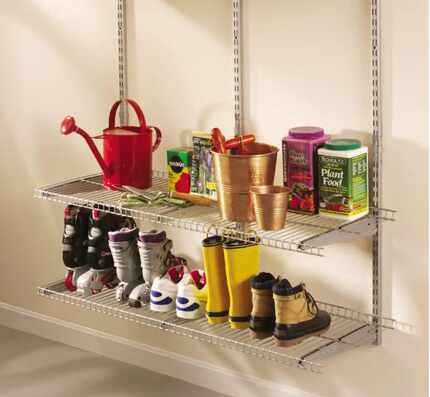 These Rubbermaid FastTrack steel garage wall shelves get items off the floor and make it...
