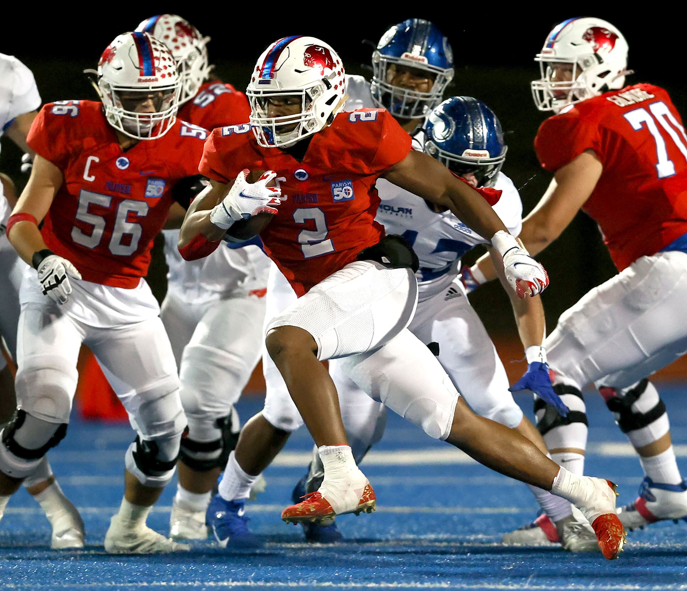 Parish running back Andrew Paul (2) finds a nice hole to run against Nolan during the first...