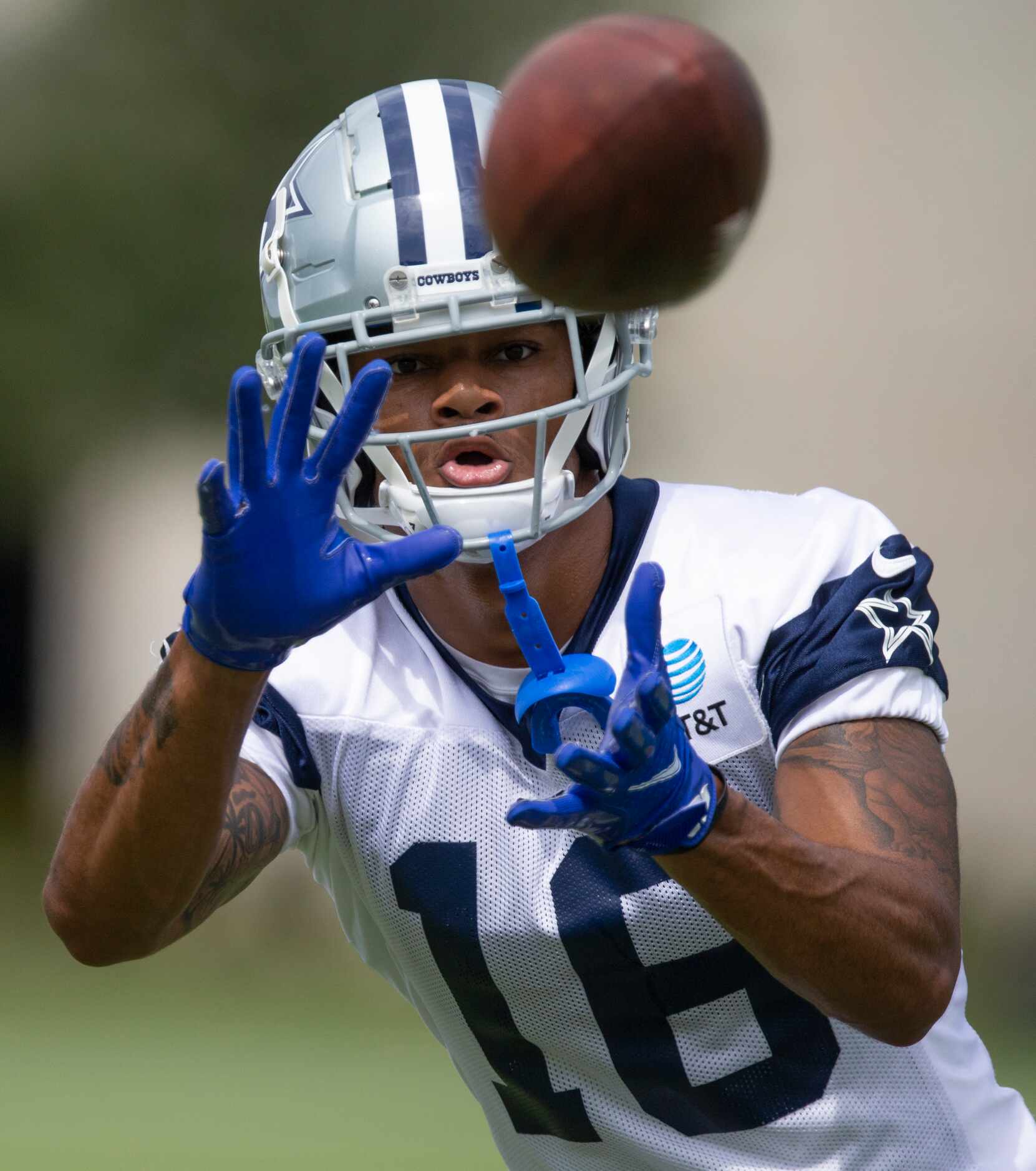 Dallas Cowboys practice squad wide receiver Osirus Mitchell catches a pass during practice...