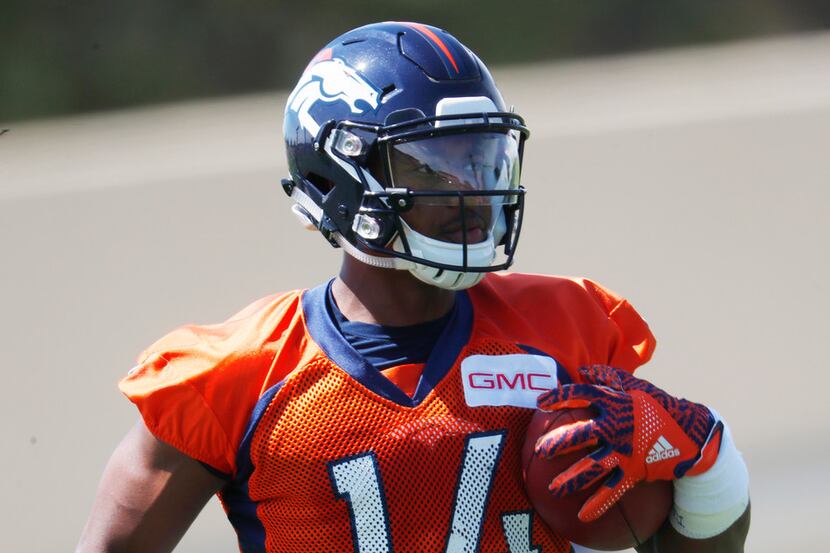 Denver Broncos wide receiver Courtland Sutton takes part in a drill during an NFL football...