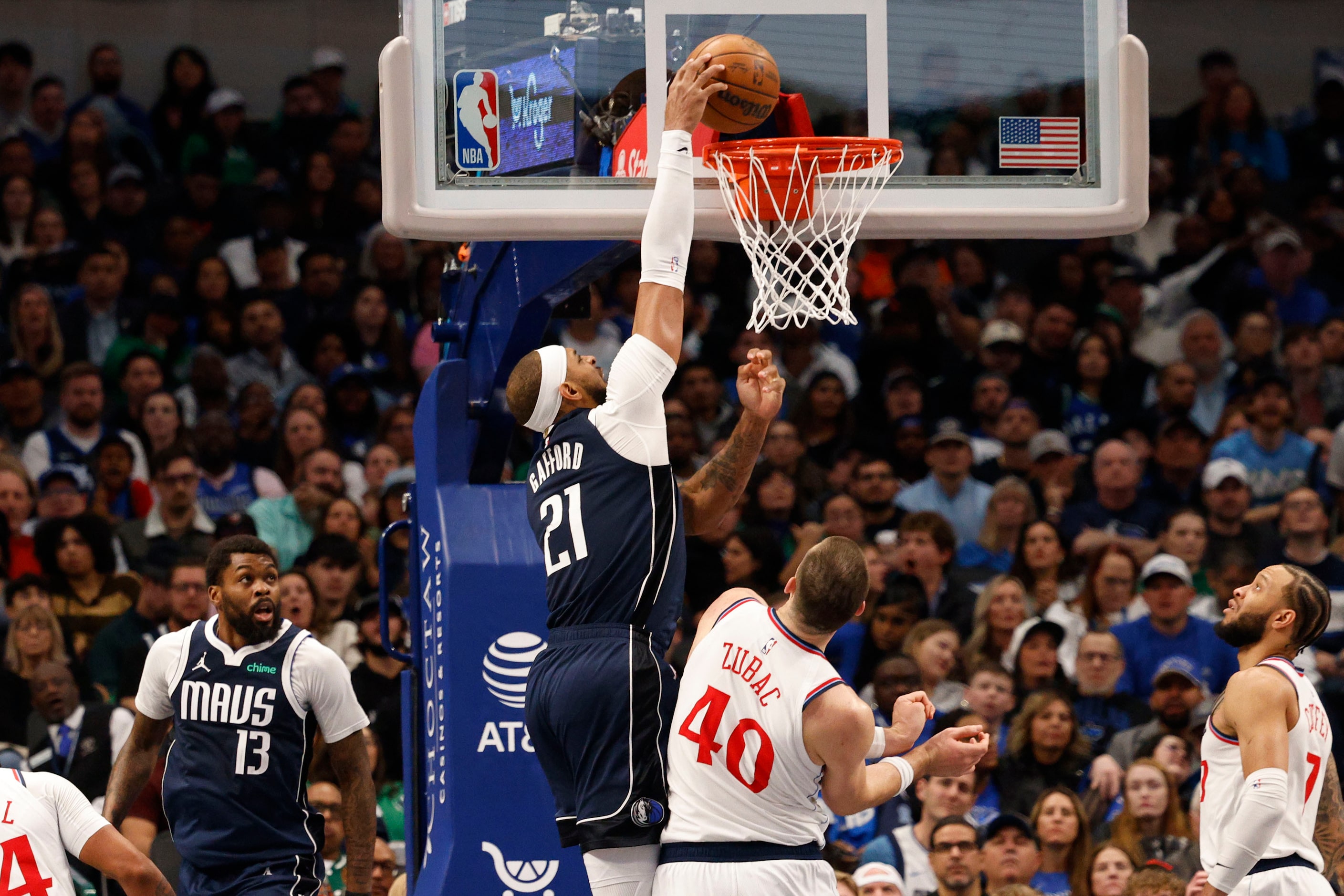 Dallas Mavericks center Daniel Gafford (21) shoots over LA Clippers center Ivica Zubac (40)...