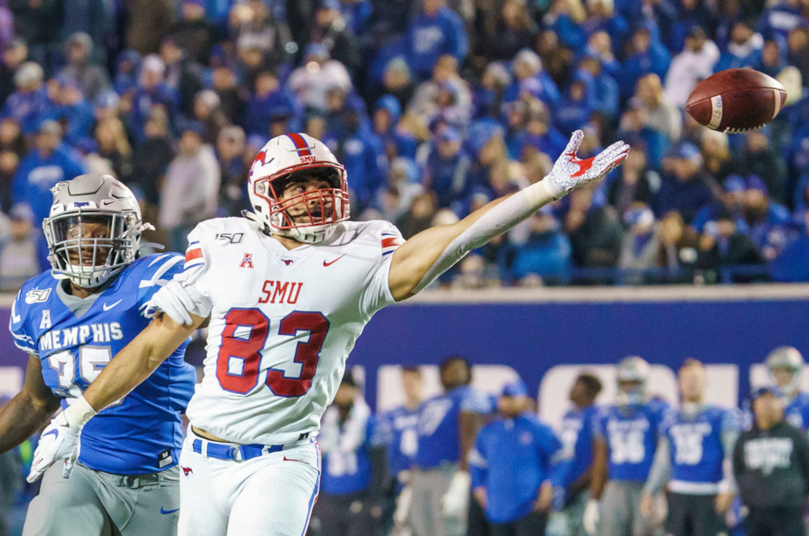 A pass goes out of reach of SMU tight end Kylen Granson (83) as Memphis linebacker Tim Hart...