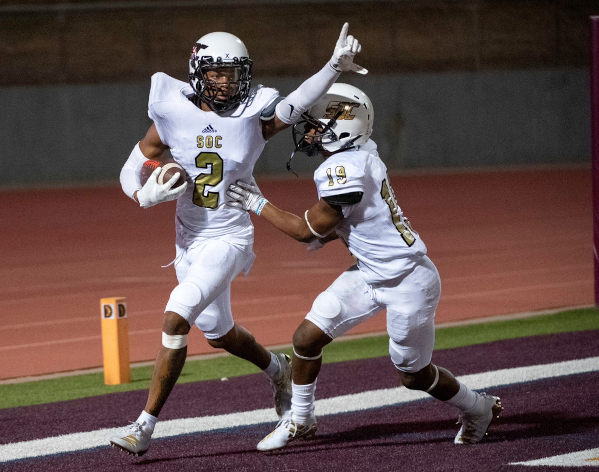 South Oak Cliff senior defensive back Courtline Flowers (2) celebrates with sophomore...