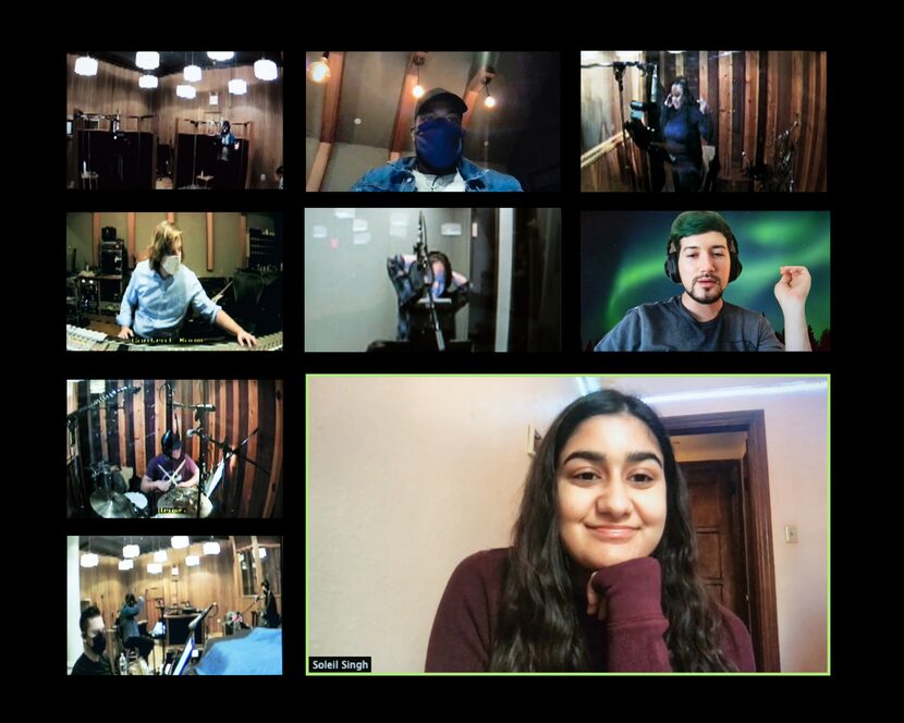 Soleil Singh (lower right), in her New Haven, Conn., dorm room, watches the recording of her...