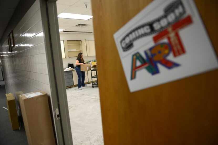 In this 2019 file photo, a teacher unpacks supplies in the art room at Shugart Elementary...