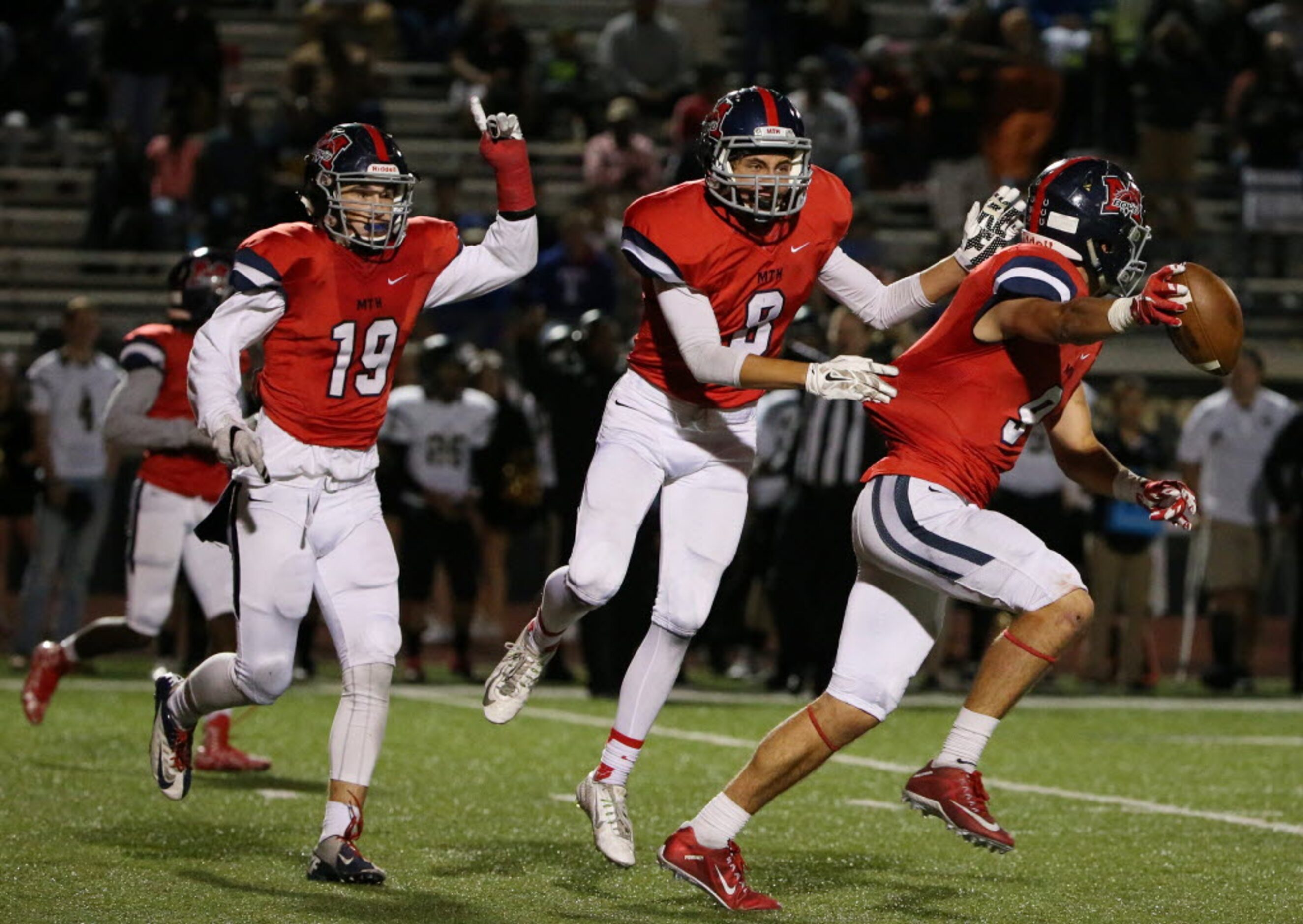 McKinney Boyd defensive backs Braxton Web (19) and Carson Mayfield (8) celebrate with Parker...