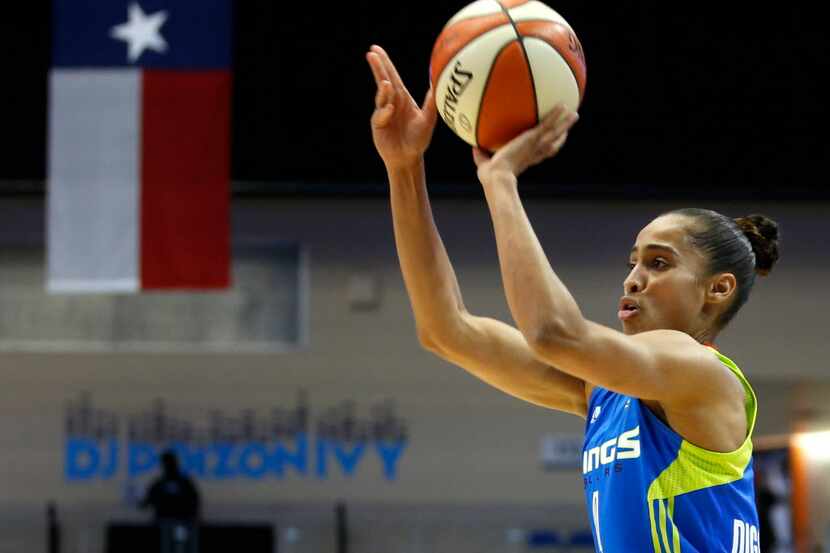 Dallas Wings guard Skylar Diggins-Smith (4) takes a jump shot in a game against the...