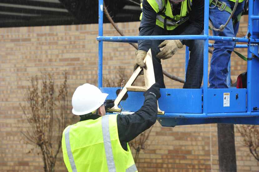 Workers removed the letters from the Sigma Alpha Epsilon house at the University of Oklahoma...