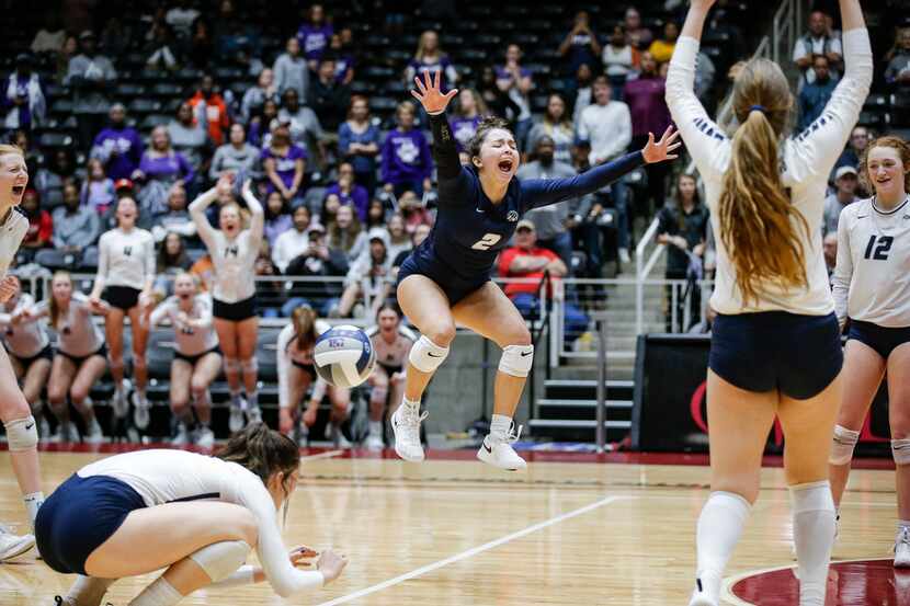 Flower Mound libero Sarah Martinez (2) and her teammates celebrate winning the Class 6A...