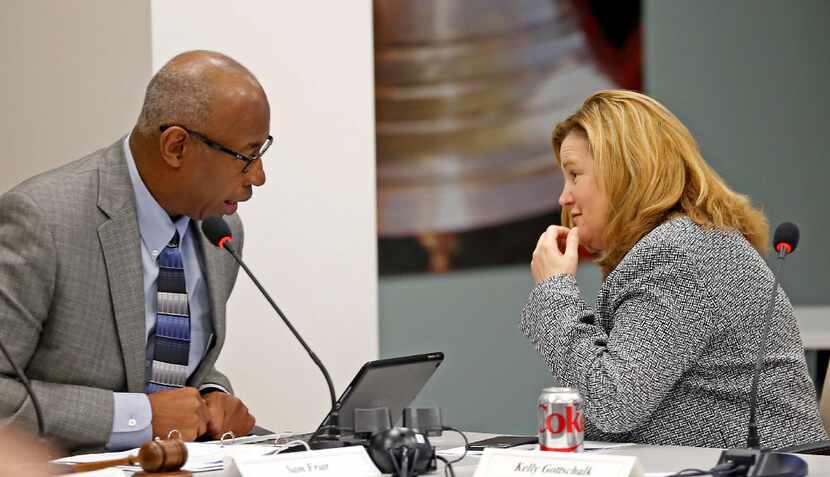 Executive Director Kelly Gottschalk (right) talks with Chairman Sam Friar during the Board...
