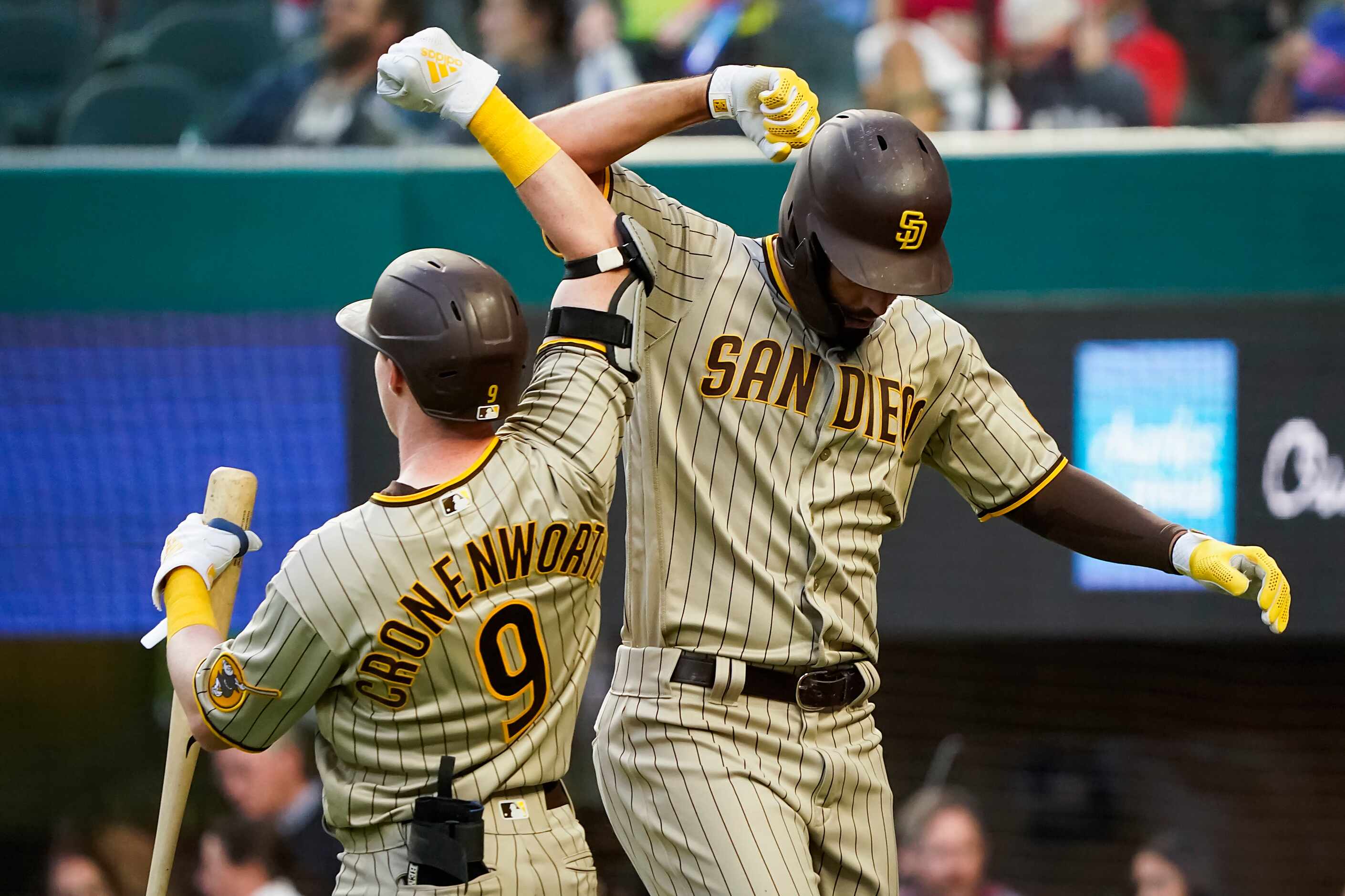 San Diego Padres first baseman Eric Hosmer celebrates with second baseman Jake Cronenworth...