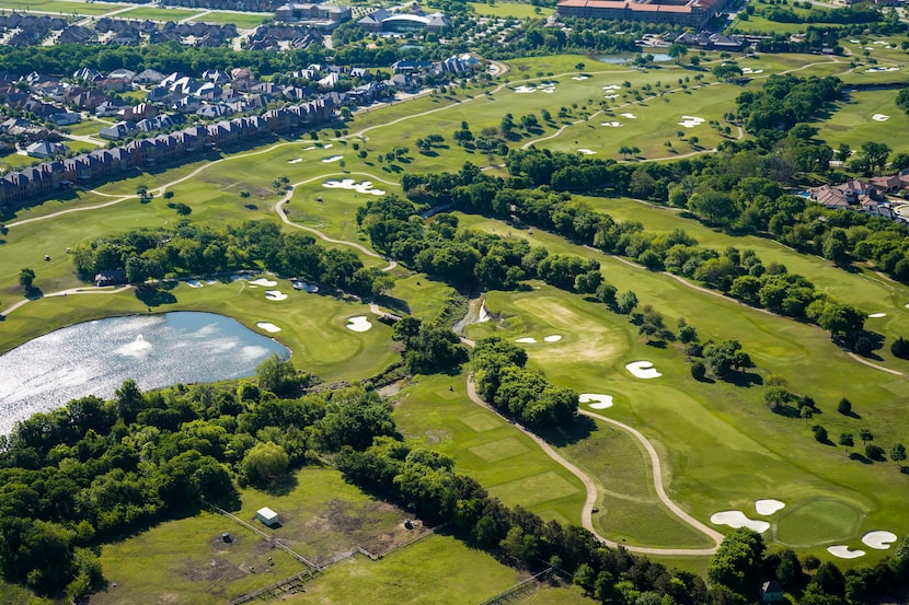 FILE - An aerial view of the TPC Craig Ranch golf course on Thursday, April 16, 2020, in...