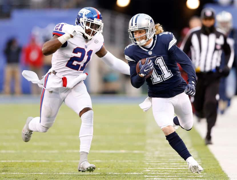 Dallas Cowboys wide receiver Cole Beasley (11) is chased by New York Giants strong safety...