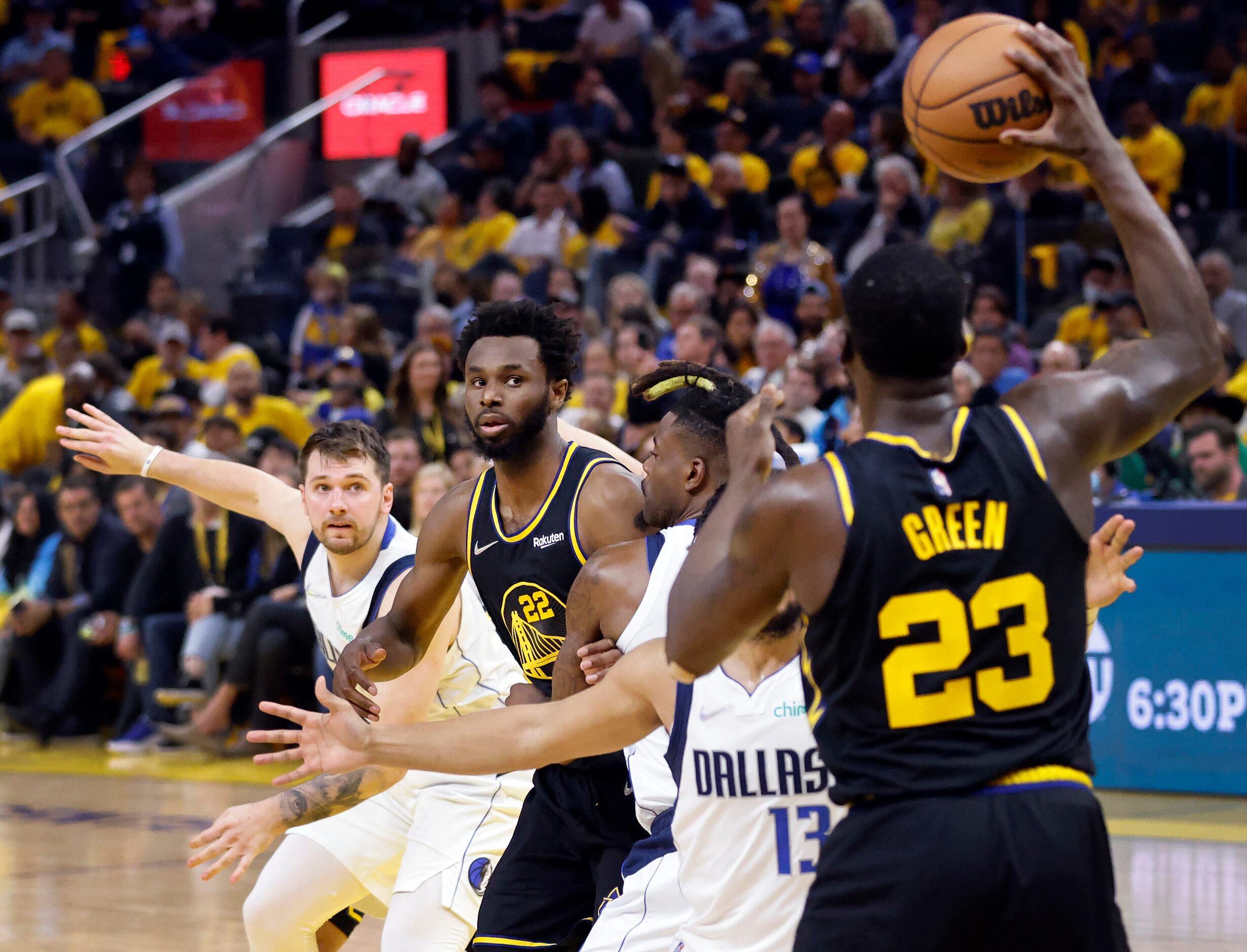 Dallas Mavericks guard Luka Doncic (left) eyes the inbound pass by Golden State Warriors...