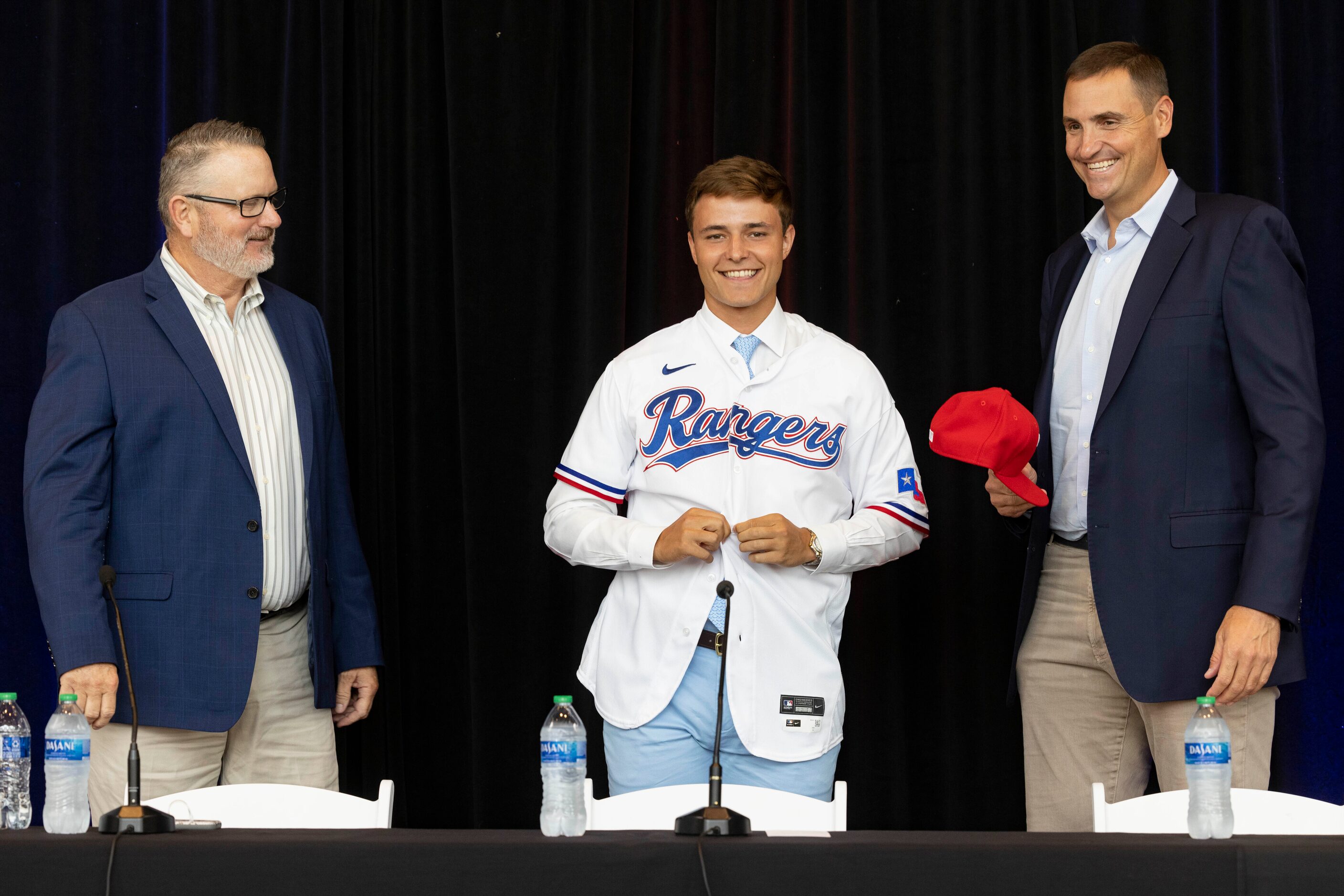 Kip Fagg (left), Texas Rangers Senior Director of Amateur Scouting, and Chris Young (right),...