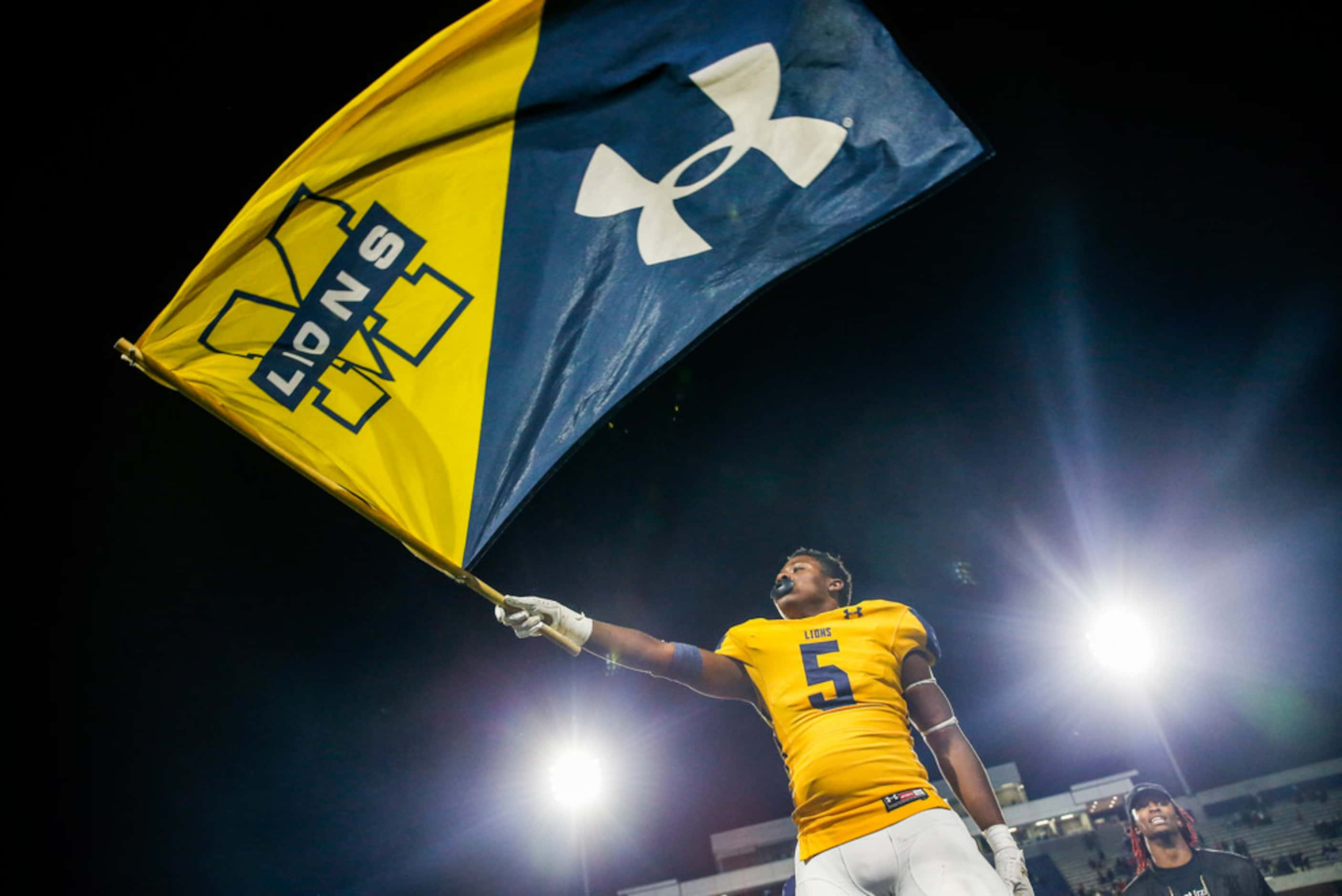 McKinney's Jalon Rocquemore (5) celebrates in the final moments of their win over McKinney...