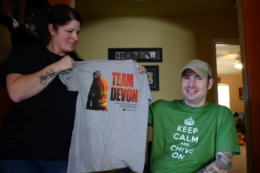 
Garland firefighter Devon Colbert and his wife Emily, pictured in their home in Rockwall on...