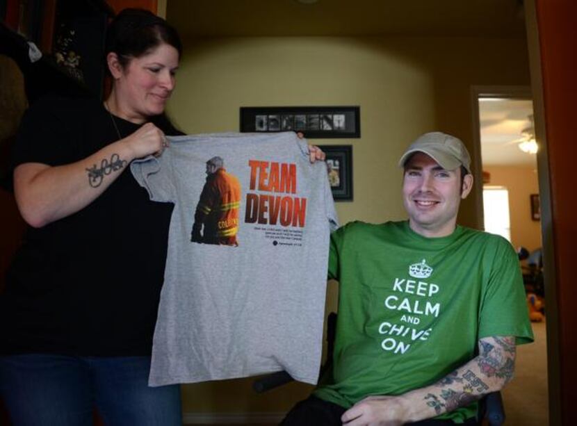 
Garland firefighter Devon Colbert and his wife Emily, pictured in their home in Rockwall on...