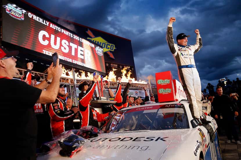 NASCAR Xfinity Series driver Cole Custer poses on his No. 3 Autodesk Ford in Victory Lane. ...
