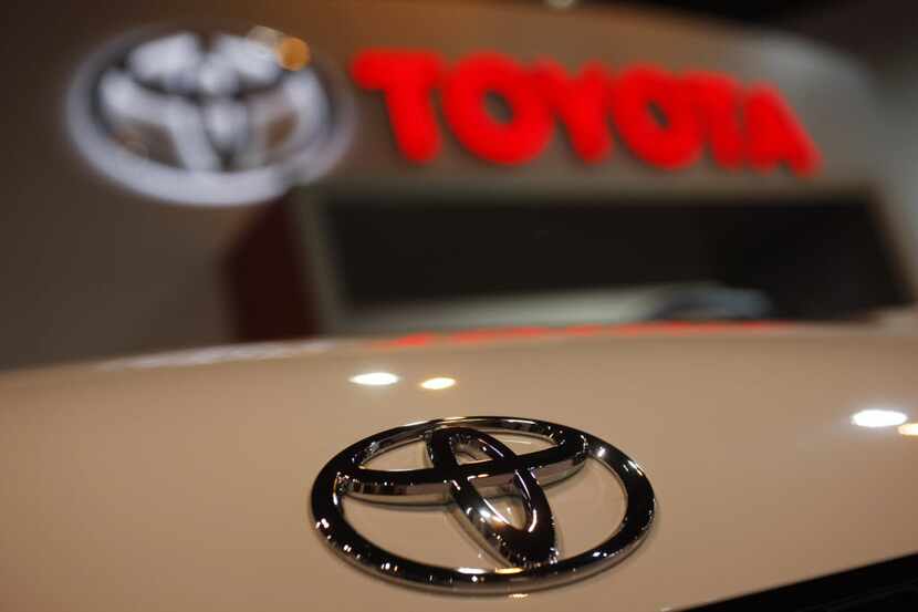 In this photo taken April 17, 2010, a Toyota emblem is seen on the trunk lid of a 2010 Camry...