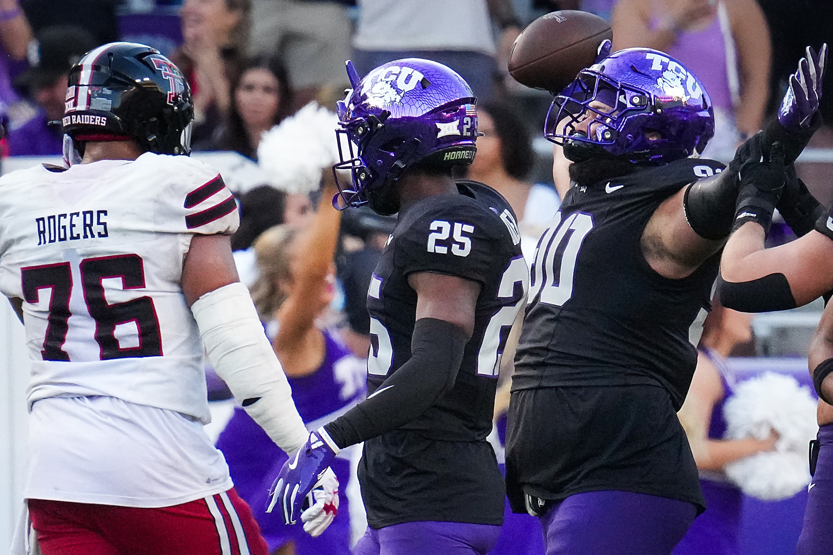 TCU defensive lineman Caleb Fox (90) celebrates after a victory over Texas Tech in an NCAA...