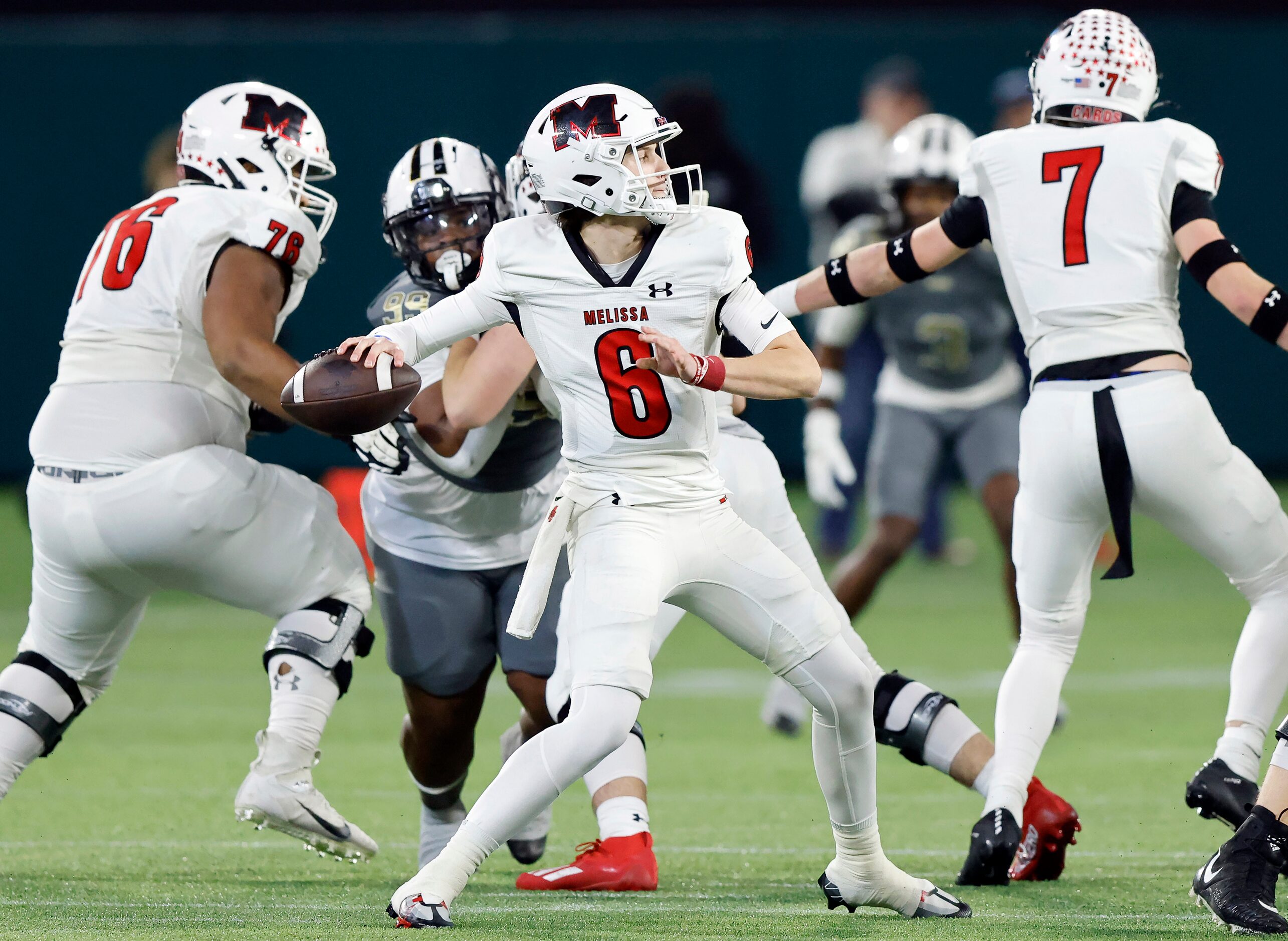 Melissa quarterback Trever Ham (6) throws a first quarter pass against South Oak Cliff in...