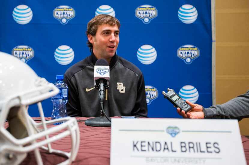 Baylor passing game coordinator Kendal Briles answers questions from media during a Cotton...