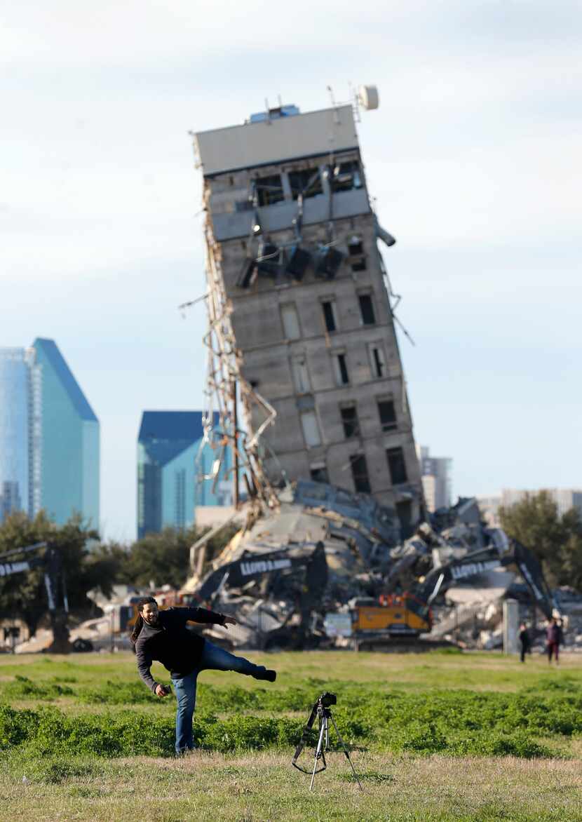 Rocky Carter snapped a self-portrait in front of the “Leaning Tower of Dallas” as demolition...