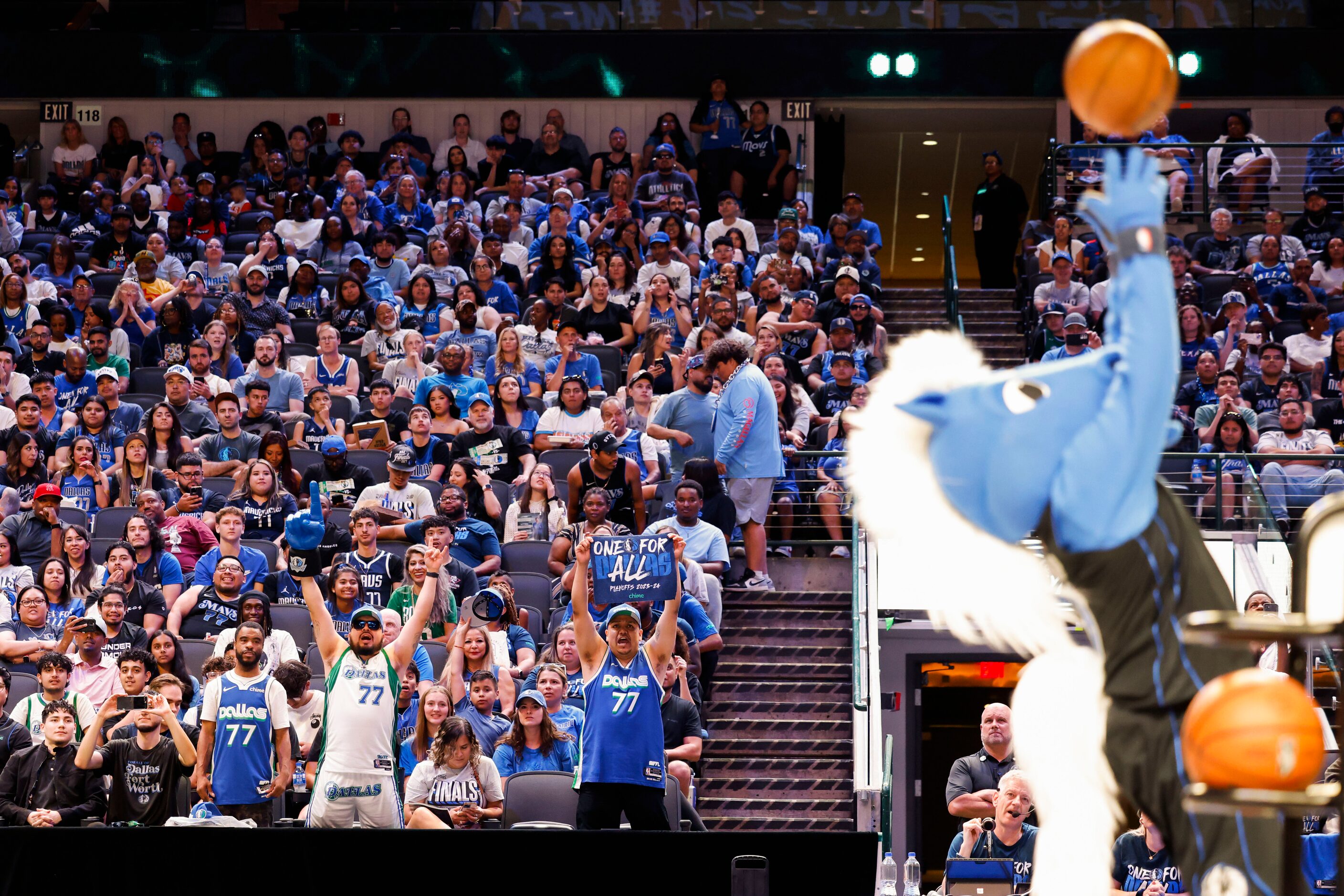 Dallas Mavericks fans cheer during a watch party of Game 1 of the NBA Finals against the...