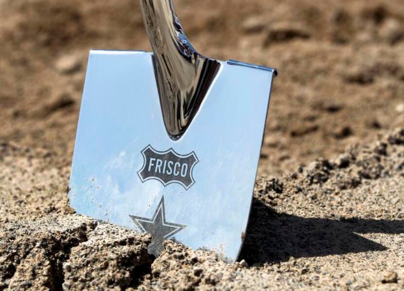 
The silver shovels used for the groundbreaking bore the logs of the Cowboys, the city and...