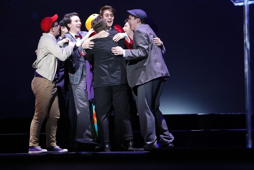 Coby Rogers, a senior at Frenship High School near Lubbock, is congratulated upon winning...