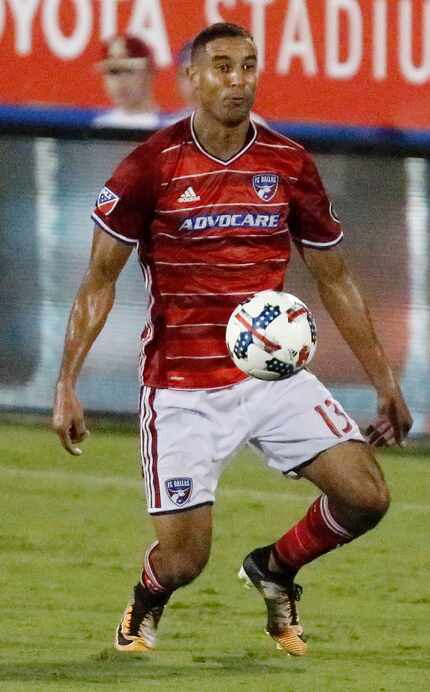 FC Dallas forward Tesho Akindele (13) uses his body to stop the ball during the second half...