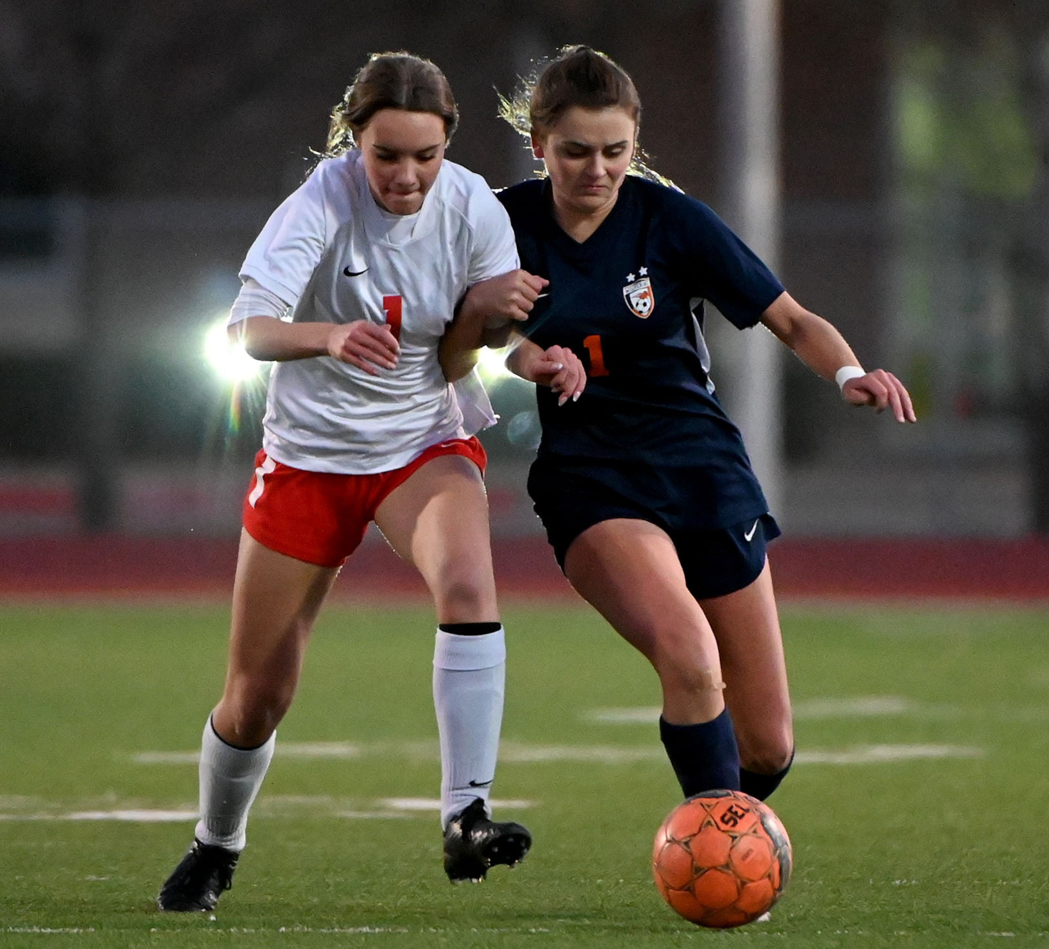 Frisco Wakeland’s Cori Cochran, right, and Frisco Centennial’s Katie Neill during a girls...