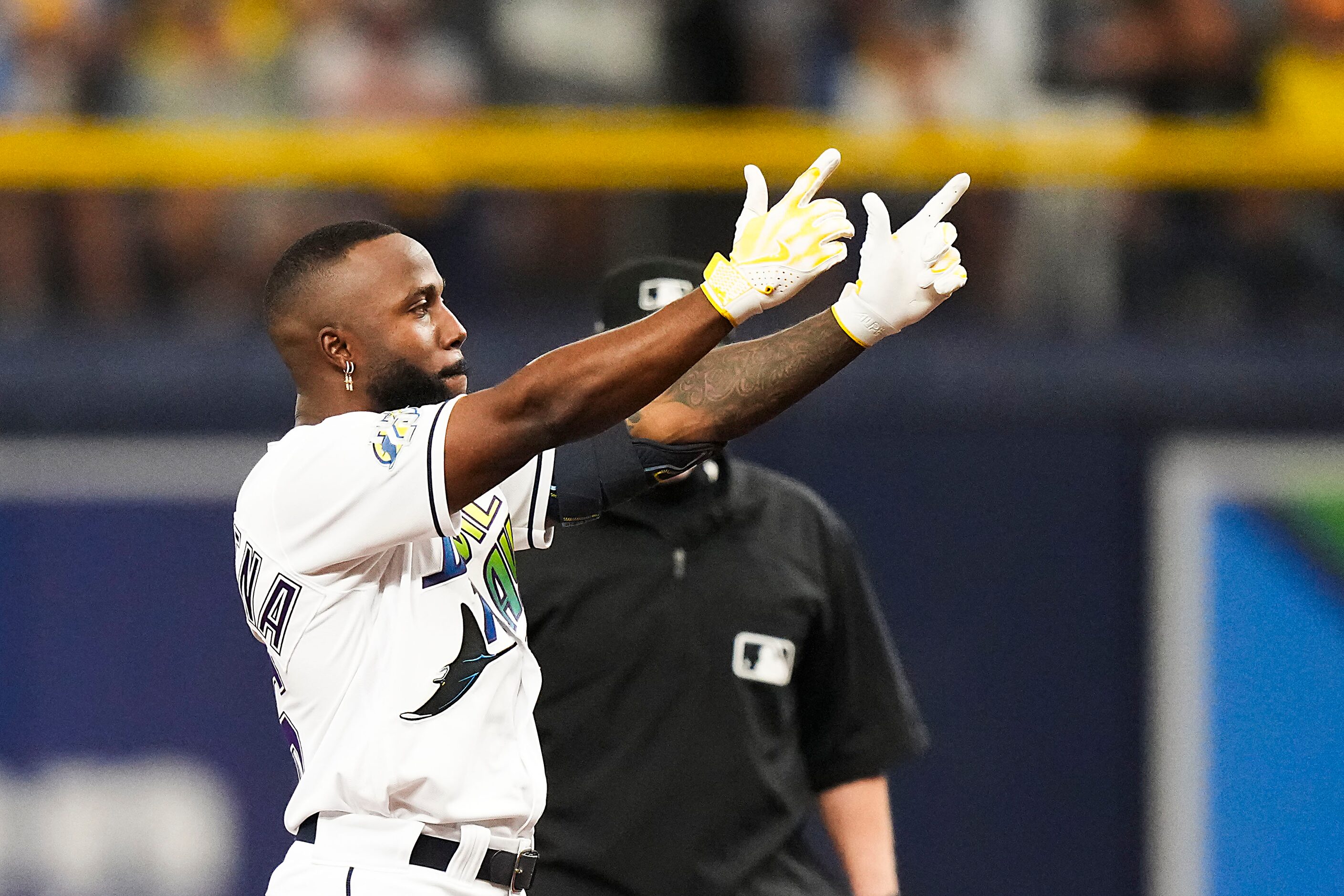 Tampa Bay Rays left fielder Randy Arozarena celebrates after hitting a double during the...