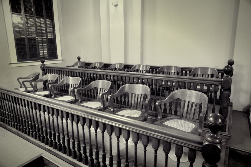 retro style photo of an old fashion jury section in a courtroom. A symbol of justice.