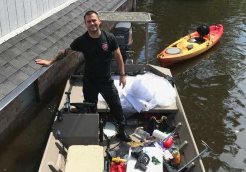 Kyle Parry retrieved his fiancee's wedding dress from his flooded house in Lumberton on...