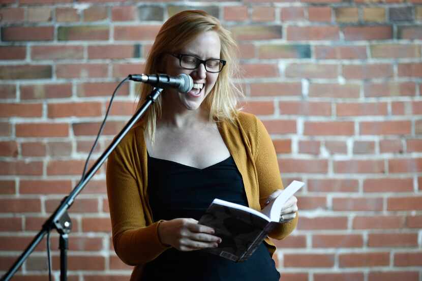 Bonnie Jo Stufflebeam reads a poem during a Spiderweb Salon event in 2017, in Denton.
