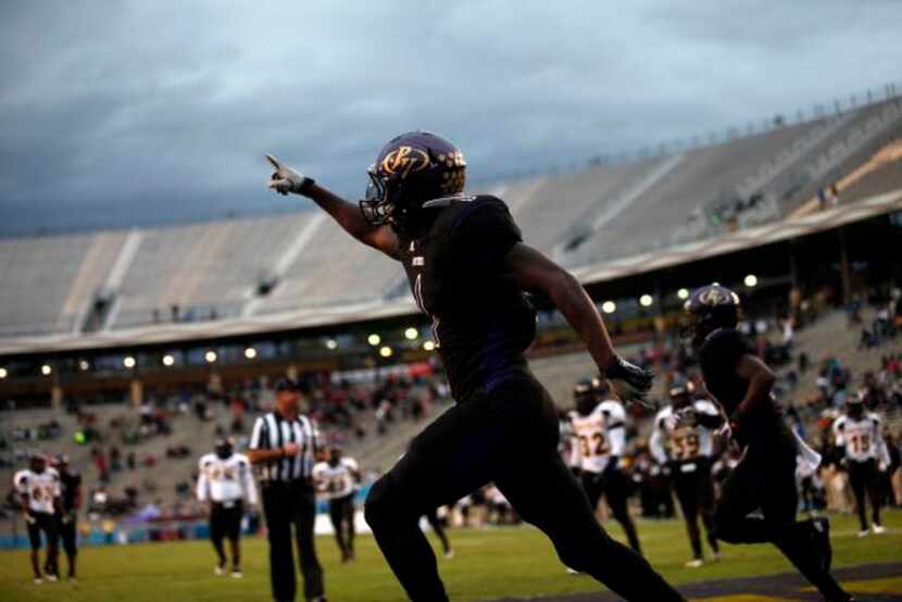 
Prairie View's Deandre Cooper (1) reacts after scoring a touchdown during the State Fair...